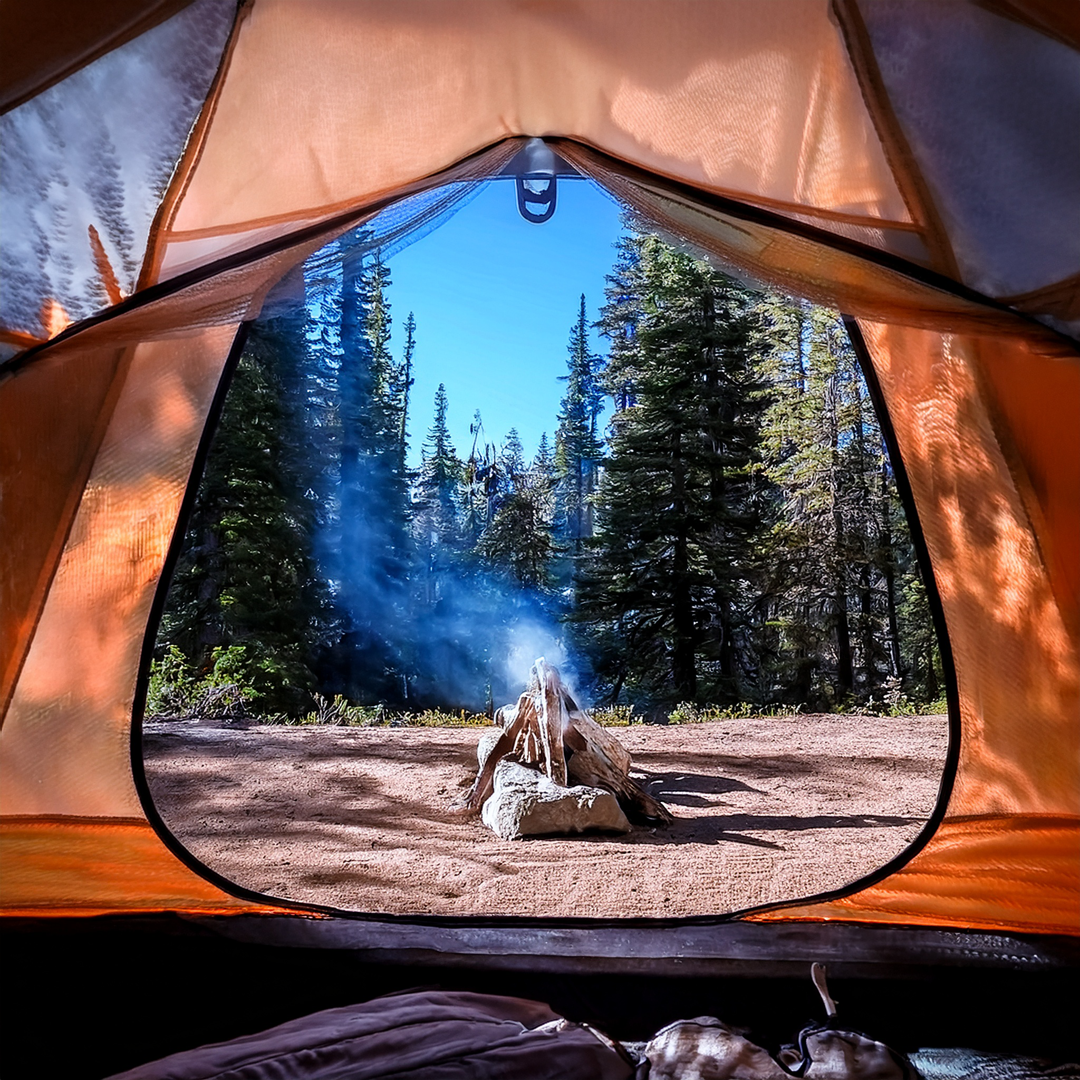 campfire from tent view